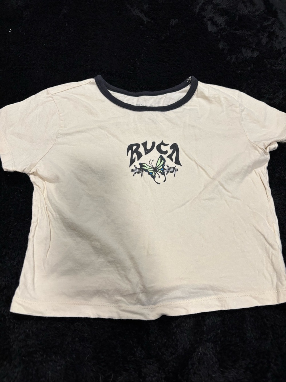 RVCA Cream Short Sleeve Tee with Black Neck Trim and Green Logo Accent